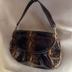 Zina Eva women’s chocolate snake design patient leather suede lining hand bag.